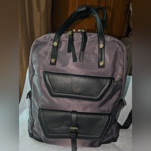 Tutilo charcoal gray with black trim backpack.